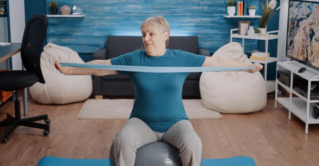 A women doing Overhead arm pull stretches